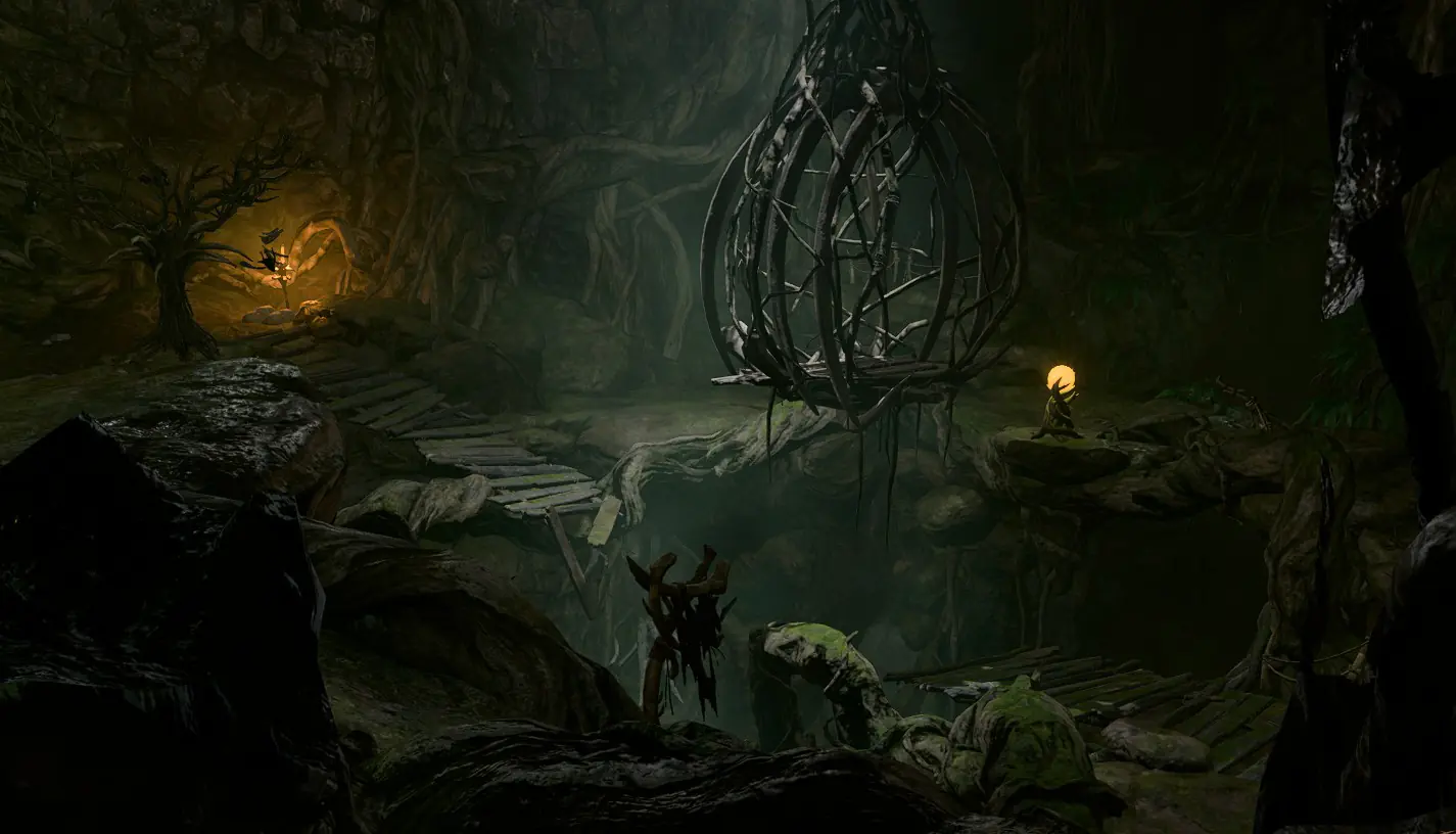 Cage hanging above a chasm